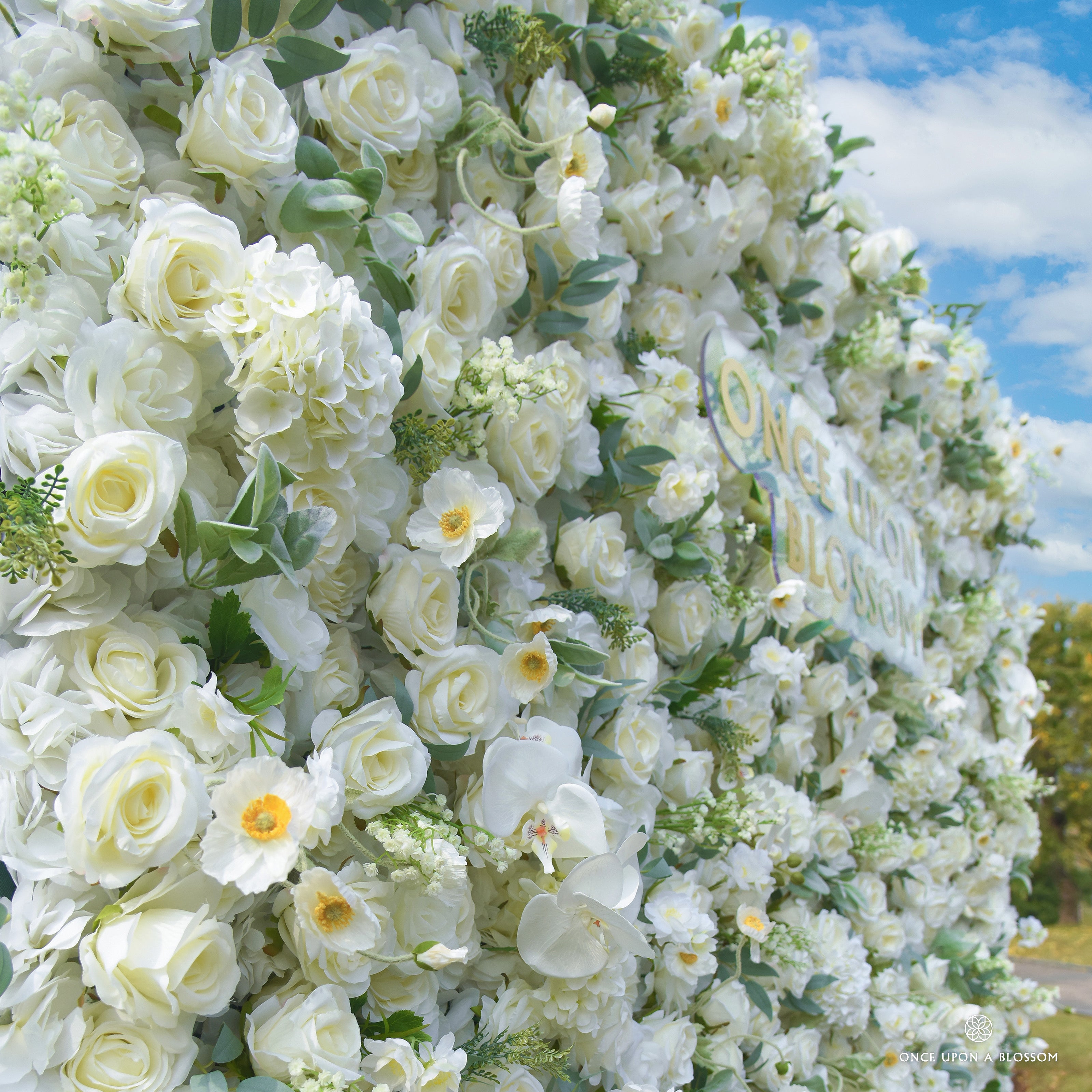 close-up of flower textures of ivory and green flower wall featuring roses and greenery, from our Moonlit Garden.