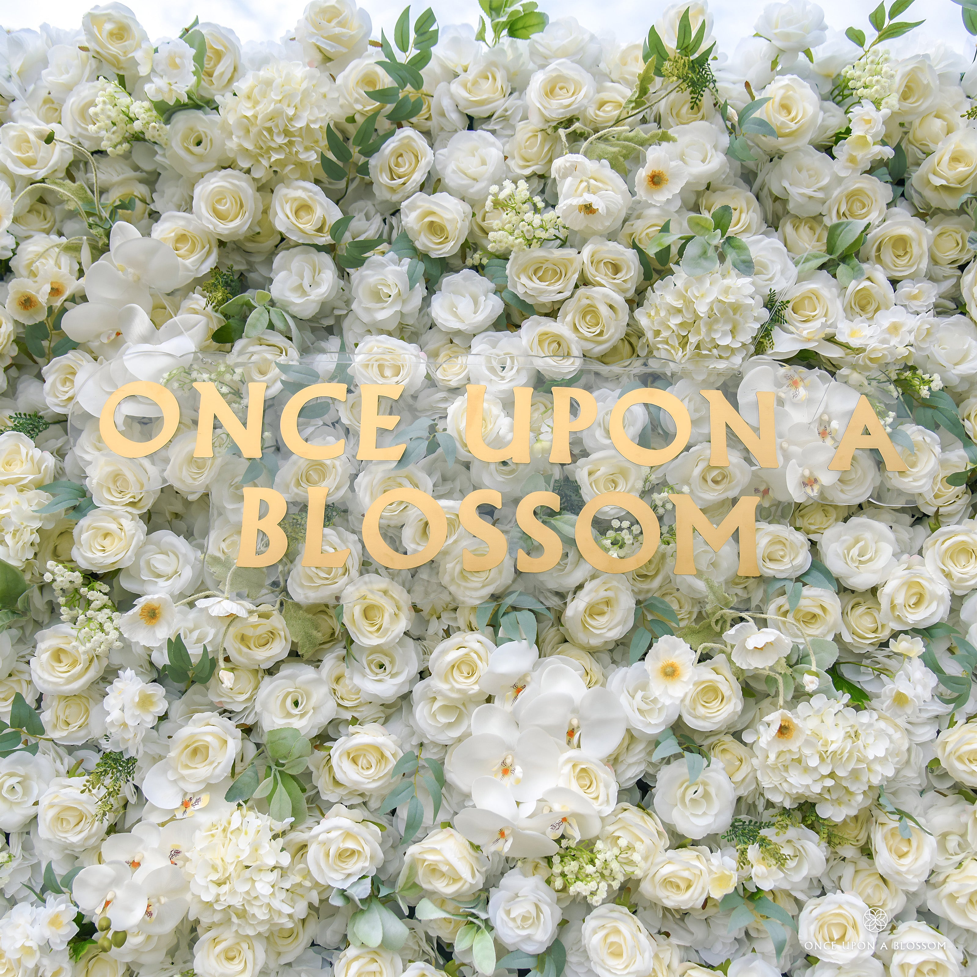 close-up of flower textures of ivory and green flower wall featuring roses and greenery, from our Moonlit Garden.