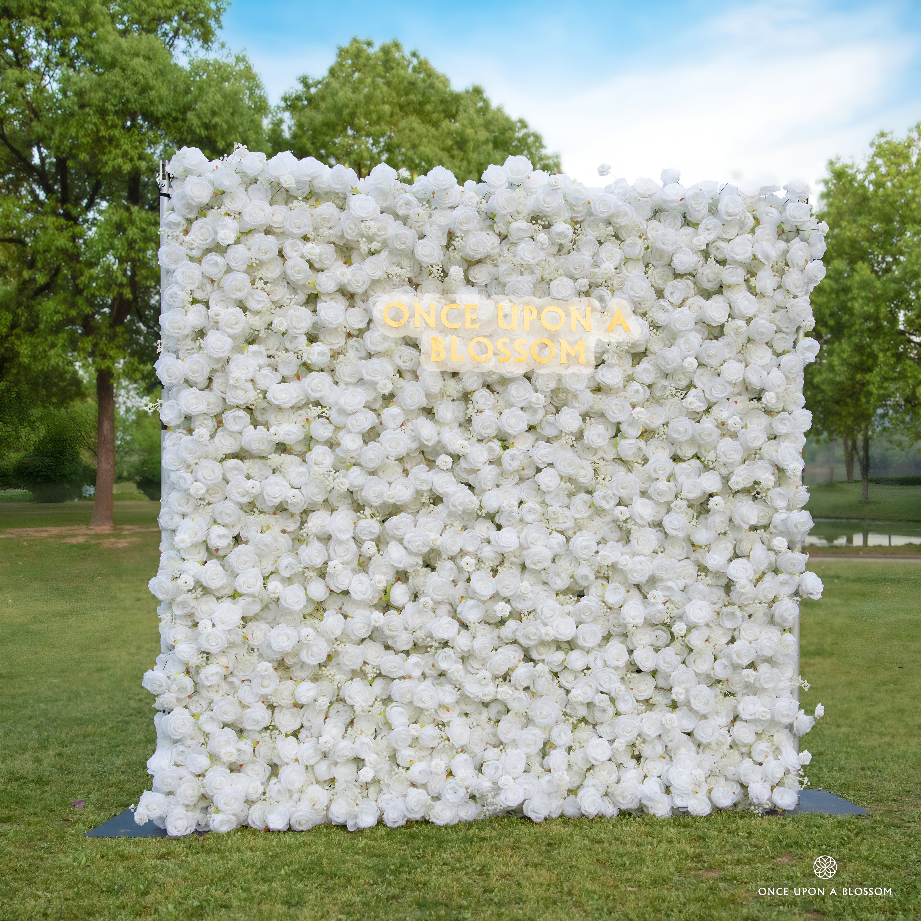 left-side angle of white flower wall featuring white roses, from our Angel’s Breath