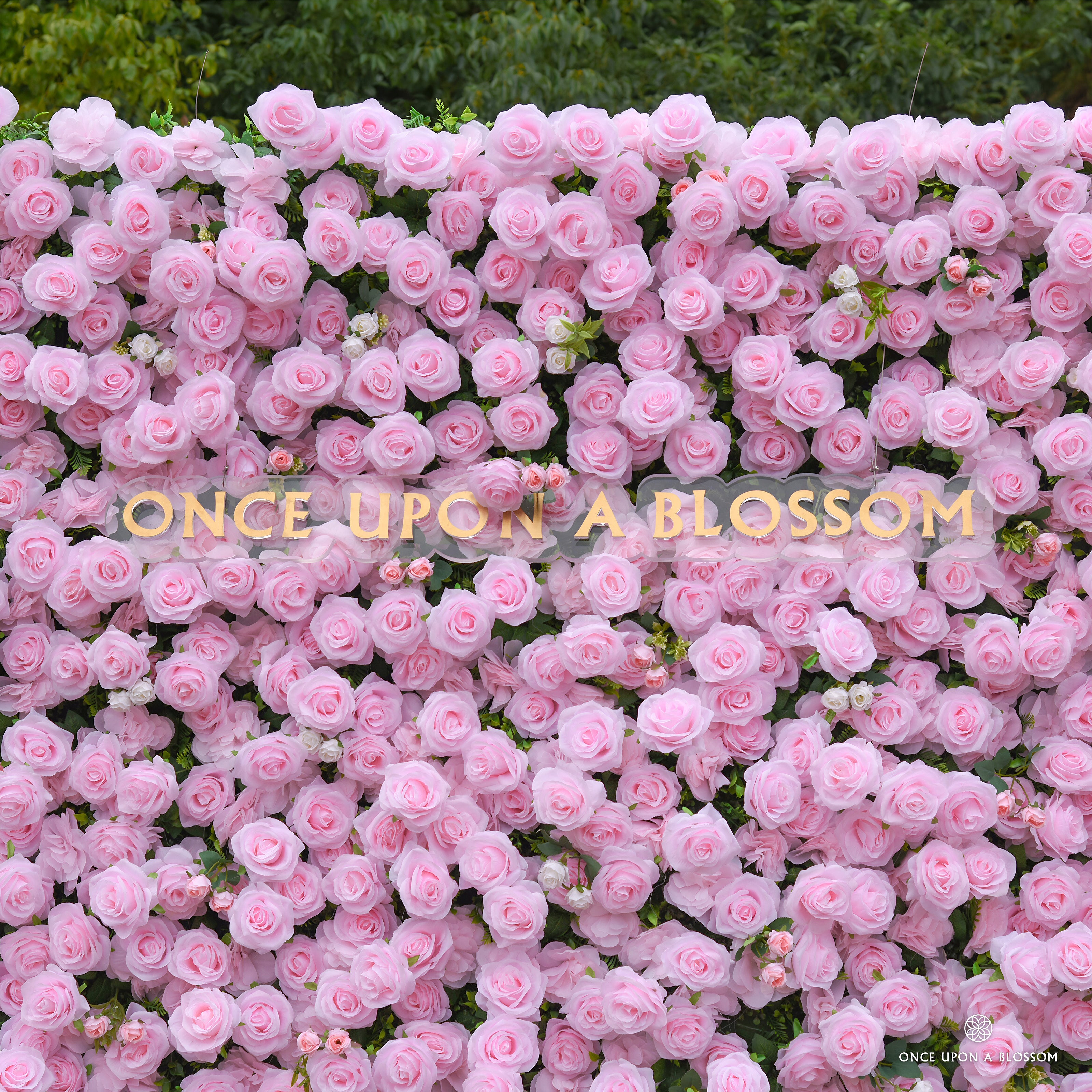 Mid-shot of the Daydream Blush wedding backdrop highlighting the layered pink florals and natural color gradient.