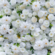 Wall of white flowers with green leaves