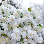 Detail of ivory artificial roses with greenery, showing delicate design of once upon a blossom flower walls