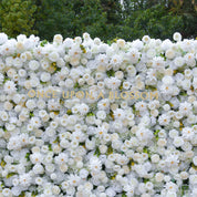 Wall of artificial flowers with 'Once Upon a Blossom' branding