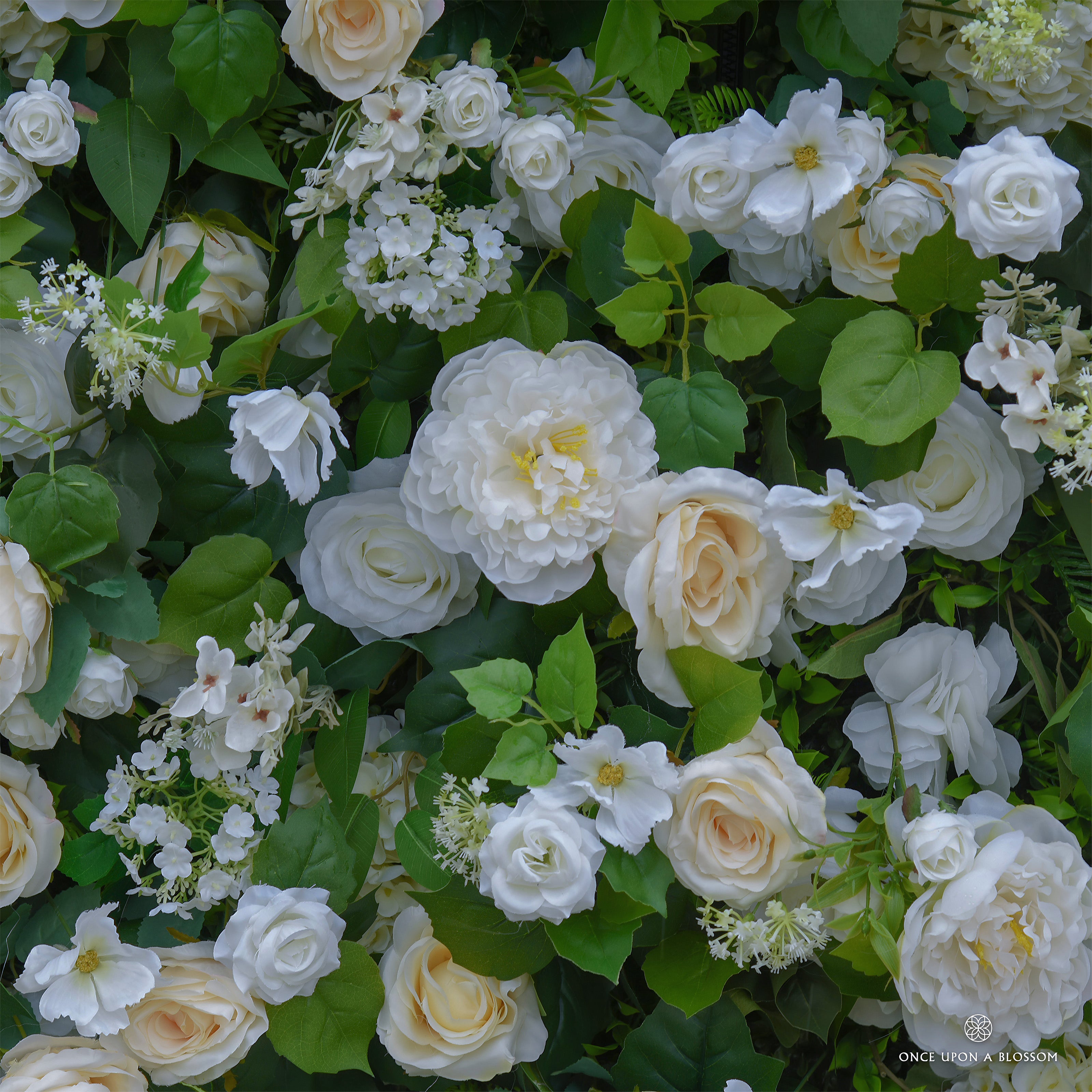 Color highlights of the Morning Sunshine flower wall featuring warm yellow tones, greenery, and airy textures.