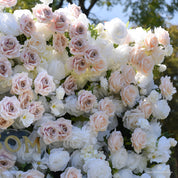 Close-up of white roses with dusty blush and champagne roses on the First Blush wedding flower wall
