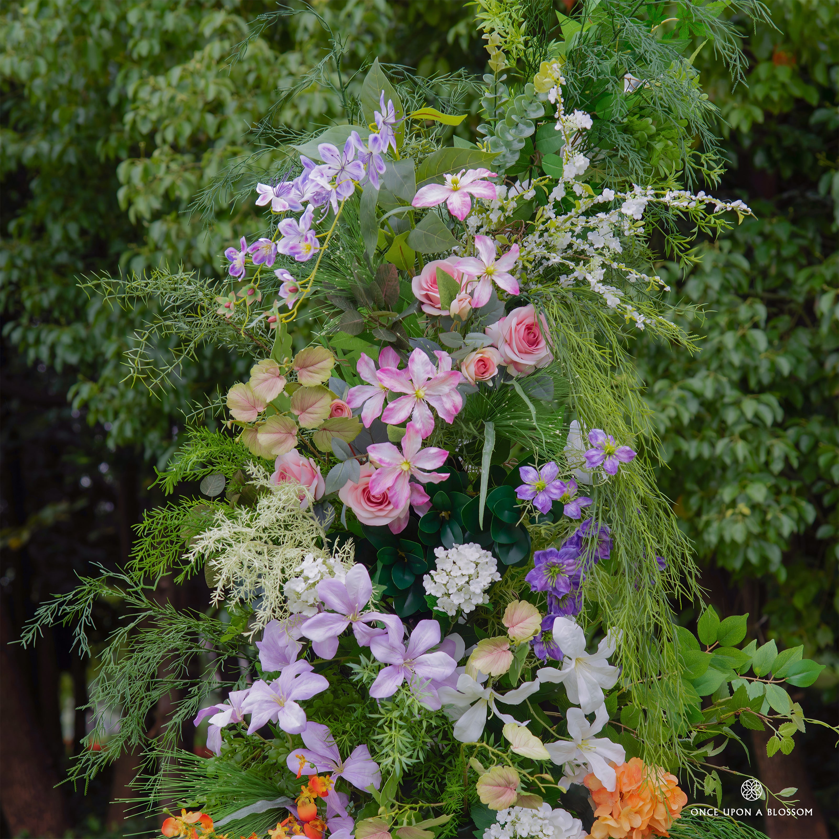 Close-up of Wild Pop arch—bright multicolor florals with playful energy.
