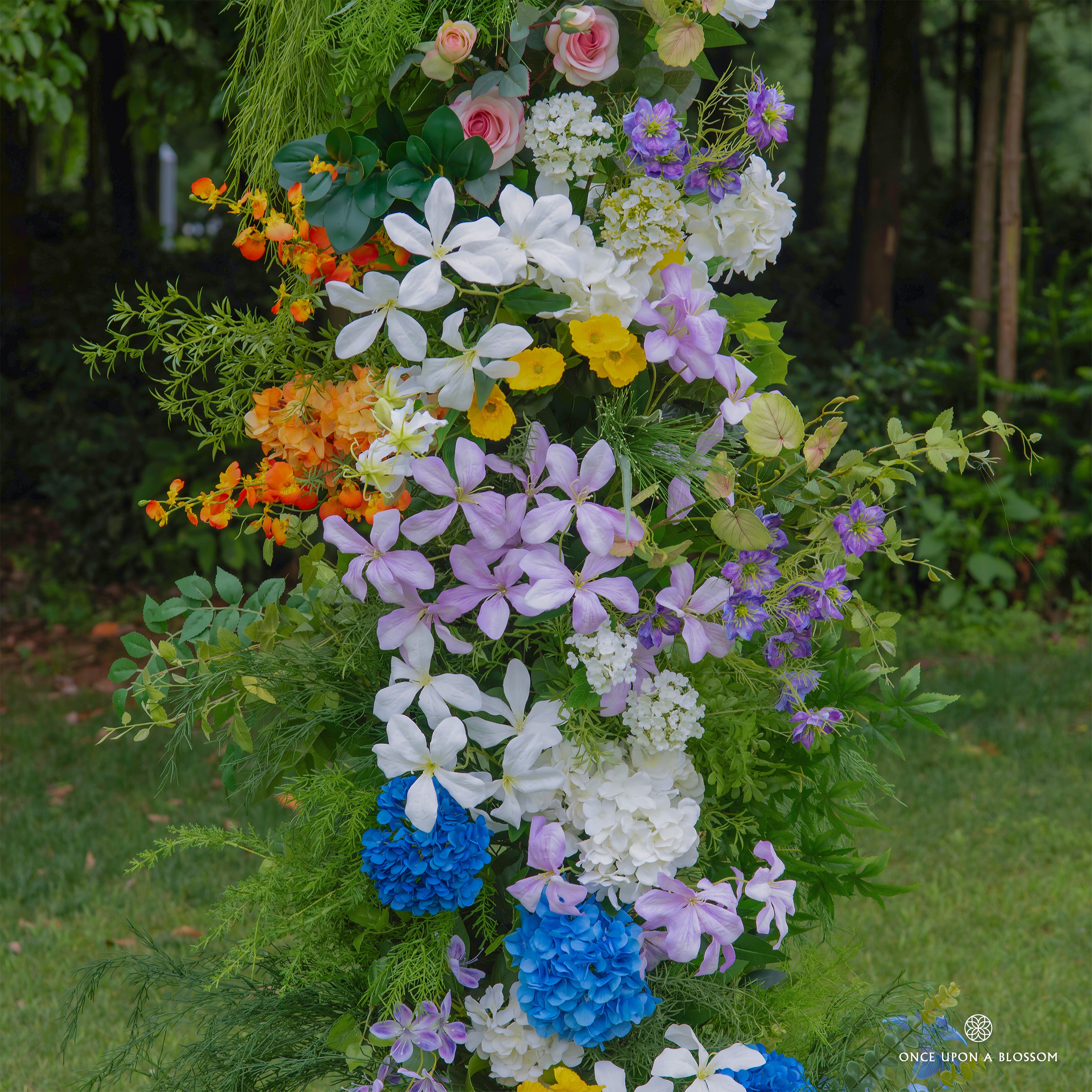 Detail shot of silk roses and hydrangeas in Wild Pop arch.