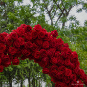 Zoomed-in floral section from Pulse—deep red roses with layered composition.