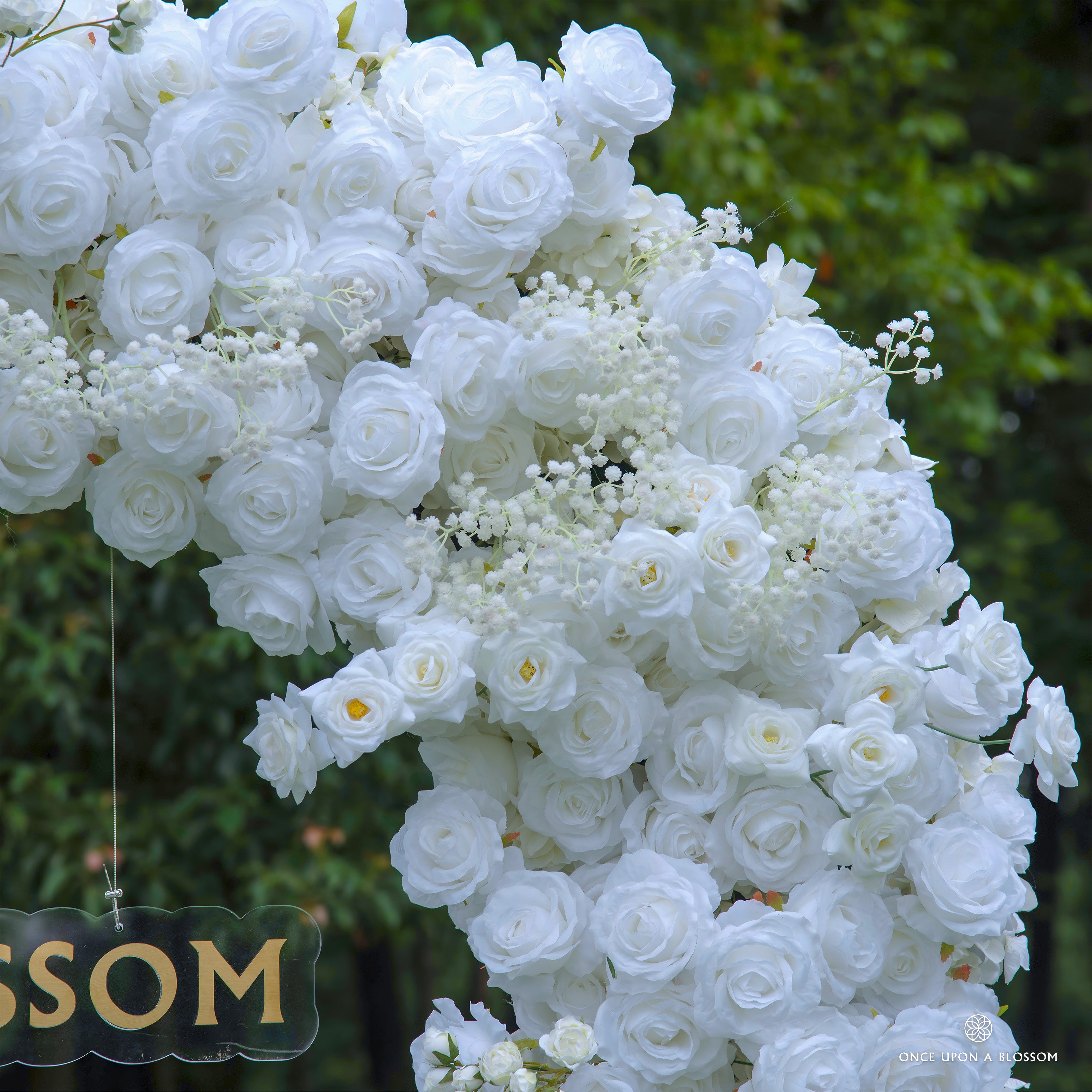 Textured view of Echo white flower arch—romantic and eye-catching design.