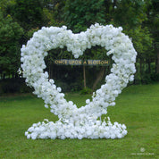 Front view of Echo white heart-shaped flower arch with white silk roses