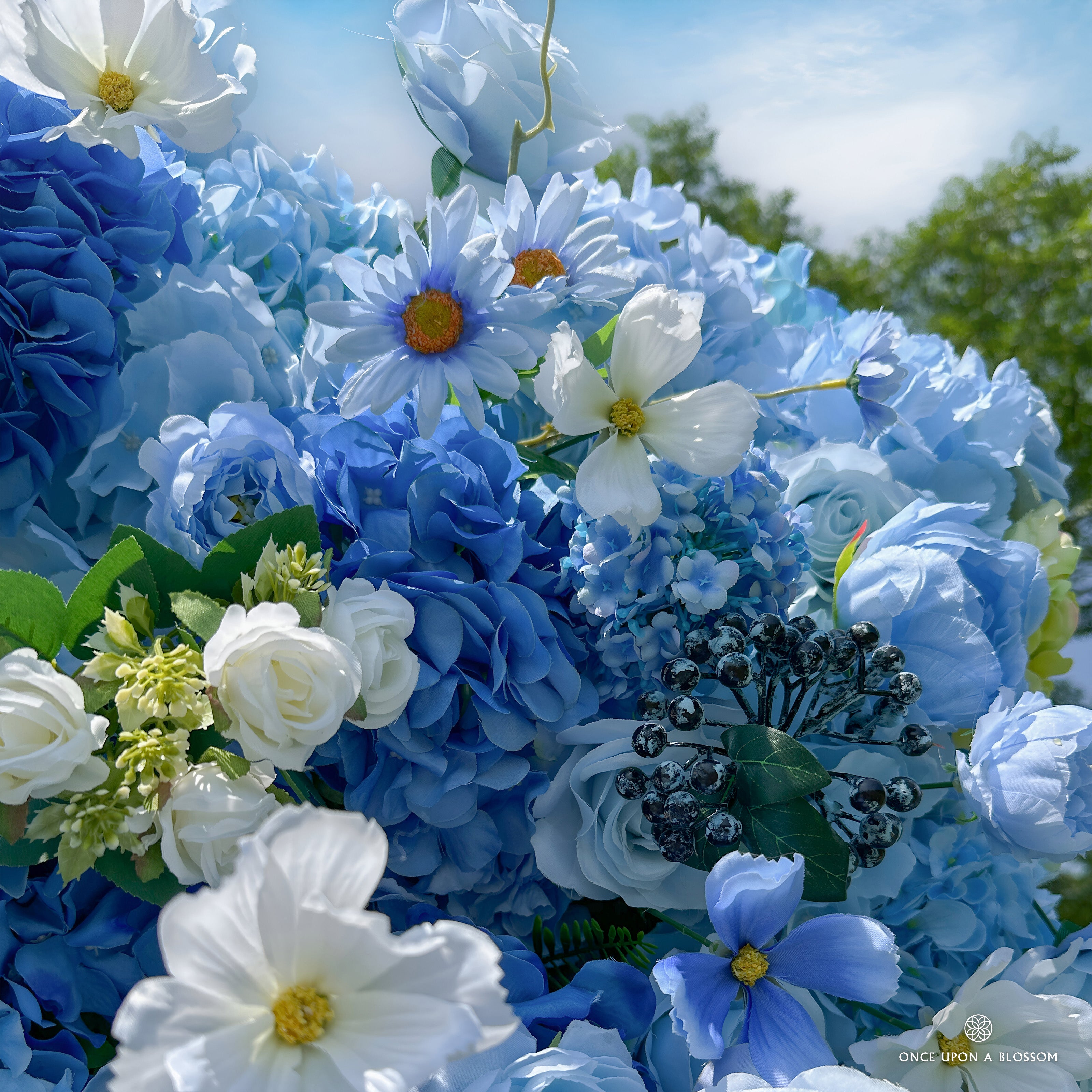 close-up of flower textures of blue and white flower wall featuring hydrangeas and roses, from our Something Blue.