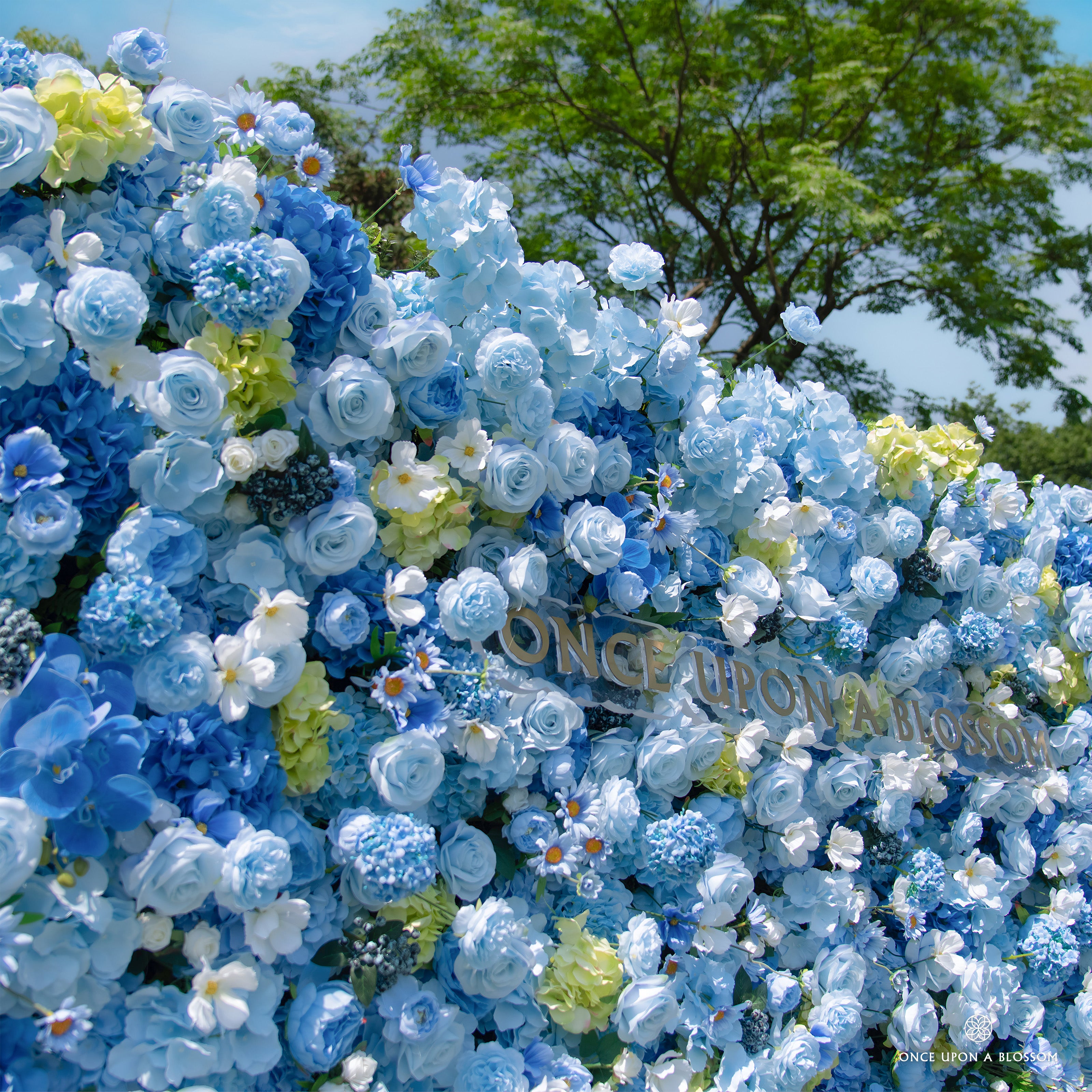 close-up of flower textures of blue and white flower wall featuring hydrangeas and roses, from our Something Blue.