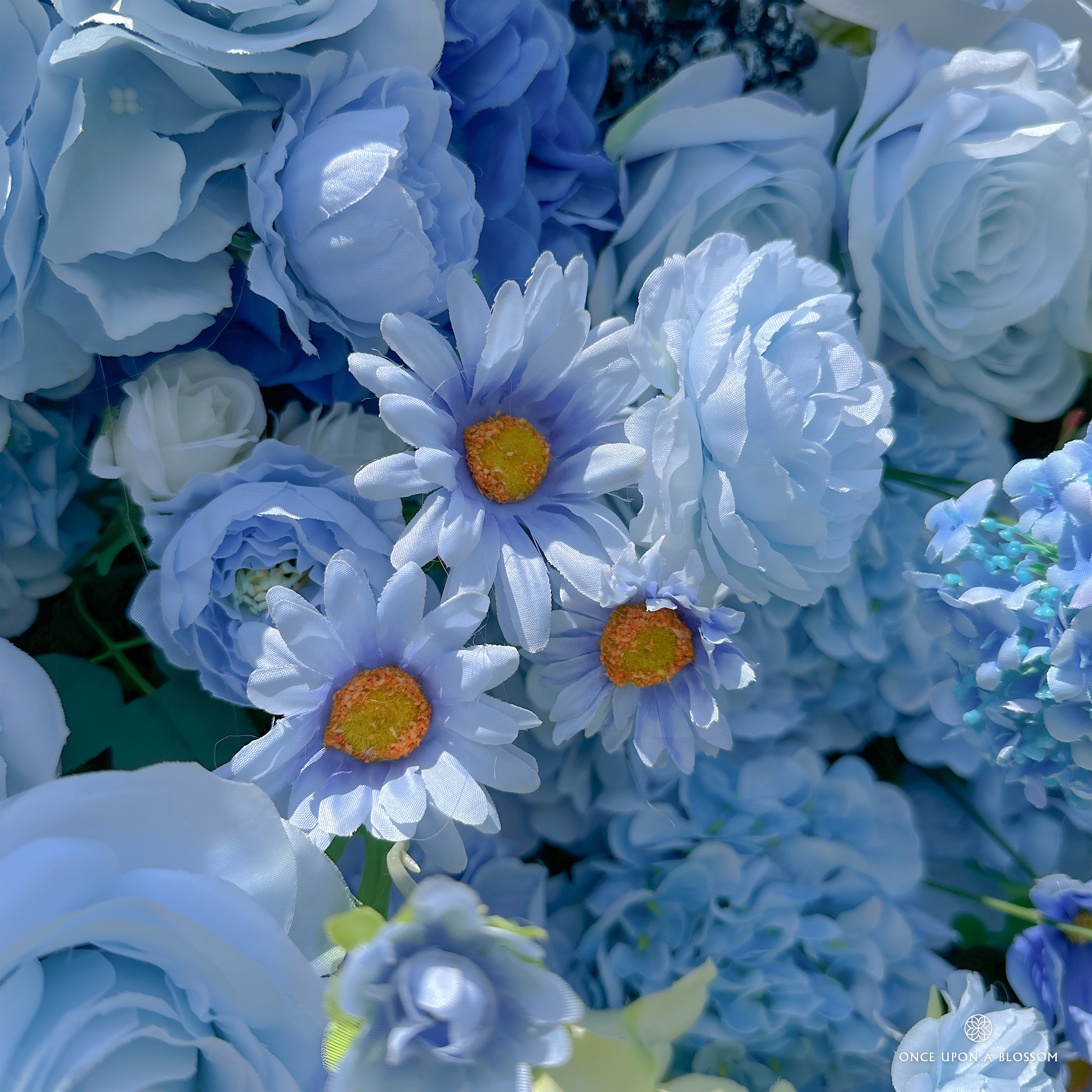 close-up of flower textures of blue and white flower wall featuring hydrangeas and roses, from our Something Blue.
