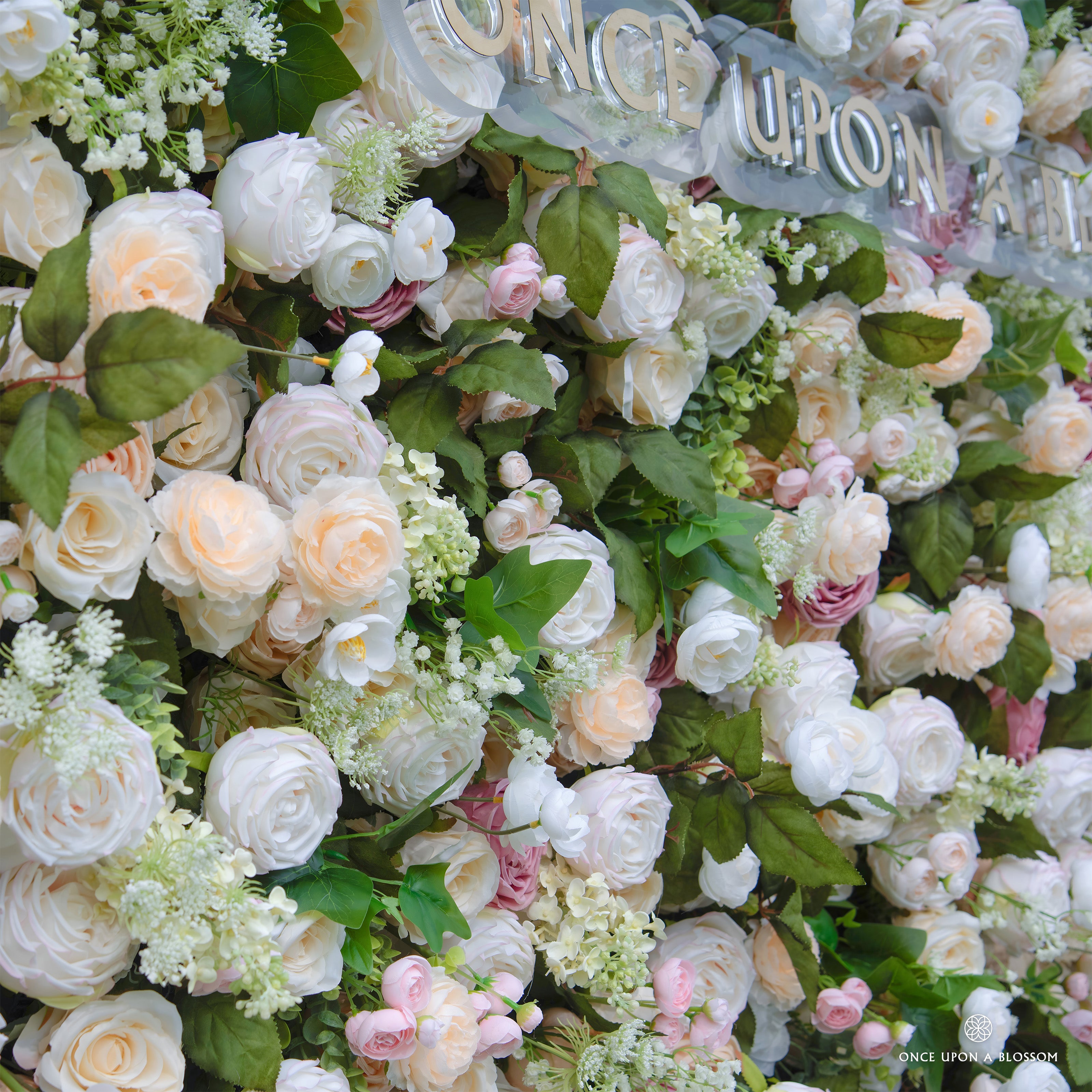 Spring Melody floral texture—soft champagne tones and lush greenery.