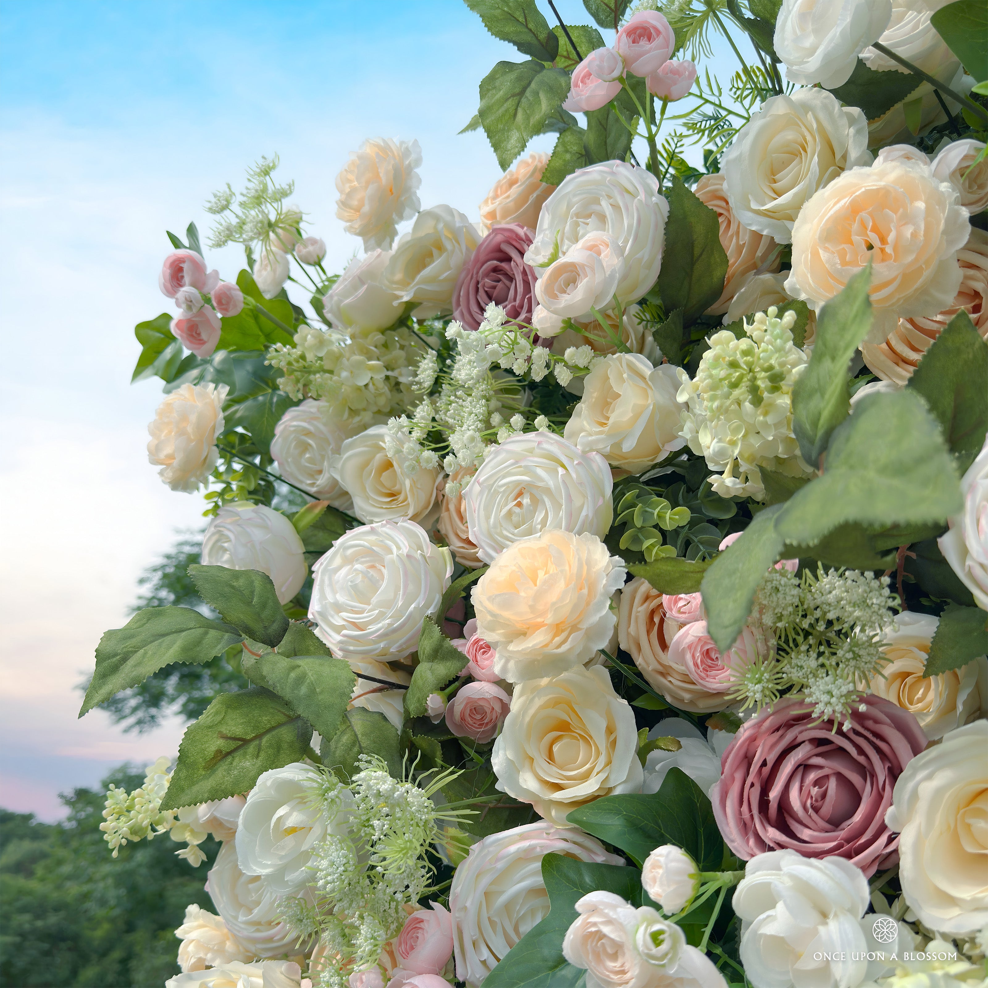 Detail of rose blooms and greenery from Spring Melody flower wall.