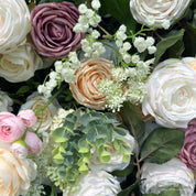 Close-up of Spring Melody with delicate rose and peony textures.