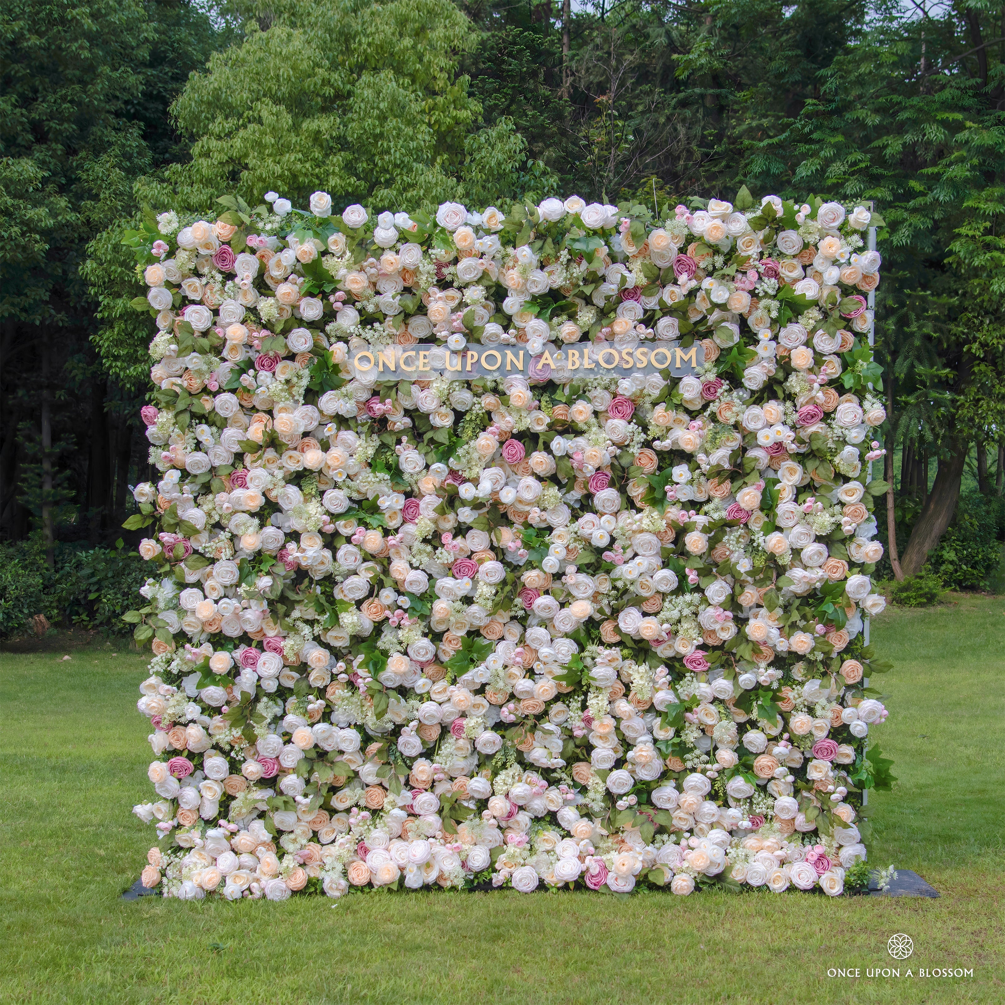 Front view of Spring Melody champagne flower wall with soft pastel roses.