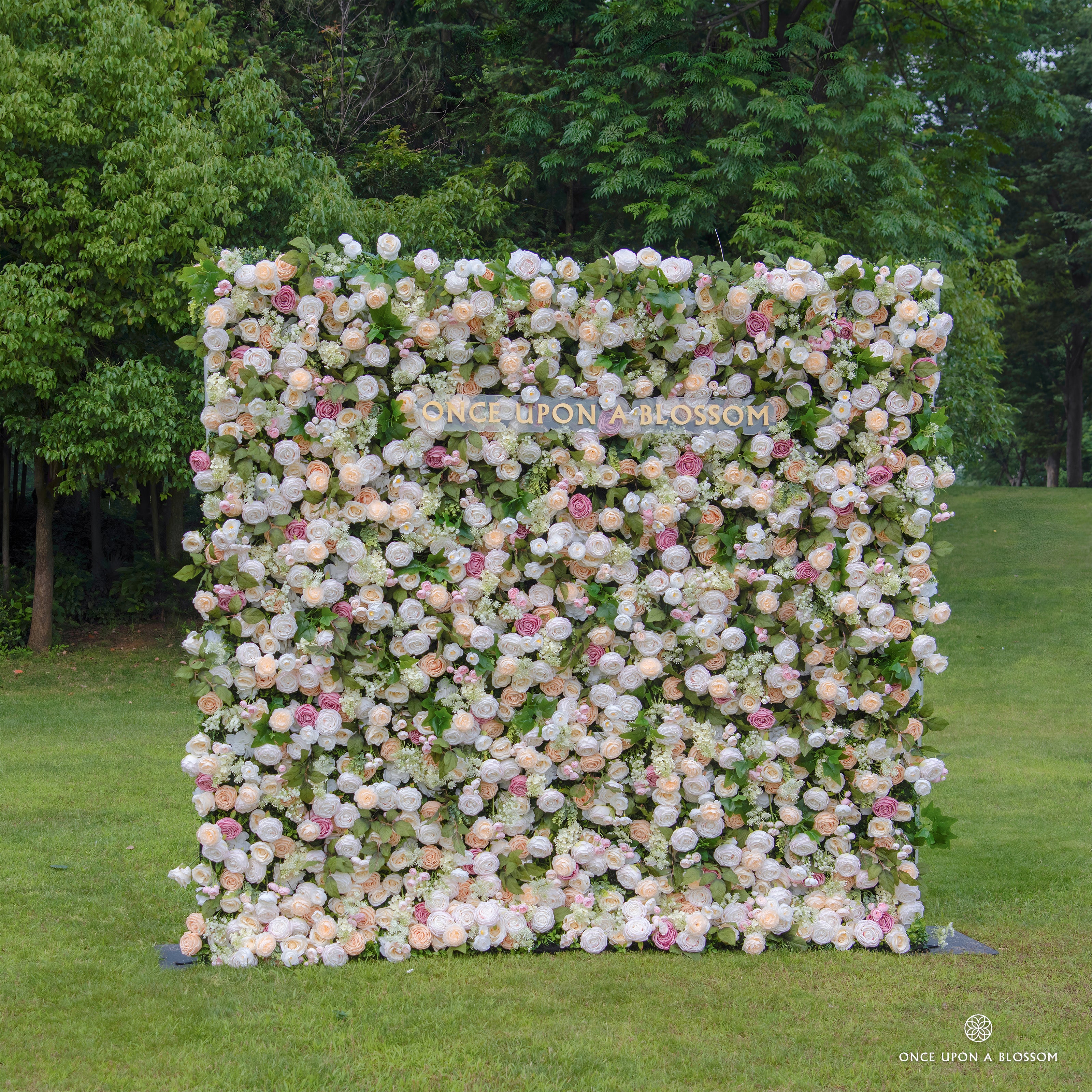Left side view of Spring Melody flower wall showing layered pastel roses.