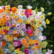 Close-up of Wildflower Field wall—purple, yellow, pink, and orange florals