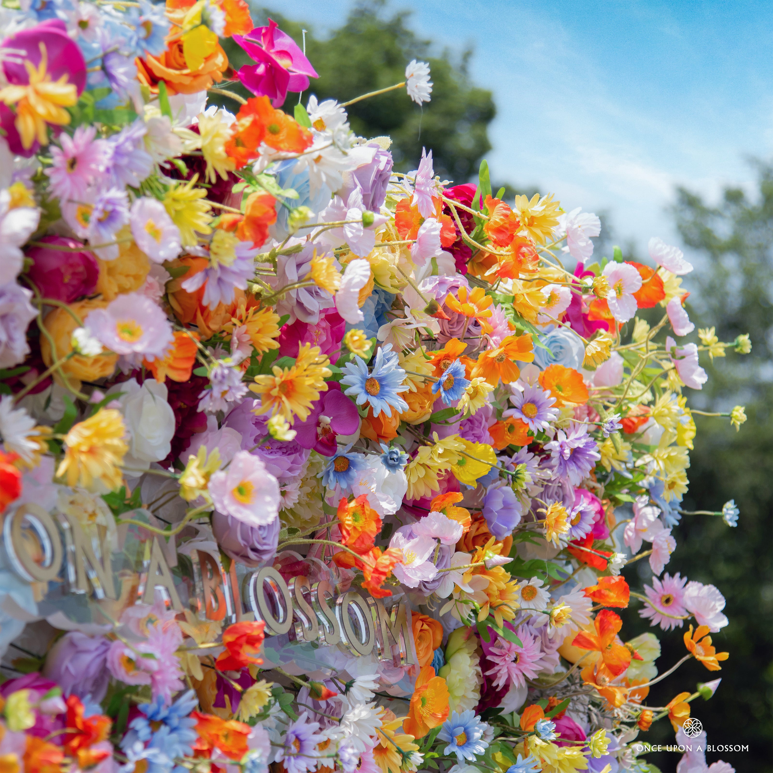 Detail view of Wildflower Field silk flowers—realistic petals in multiple vibrant tones.