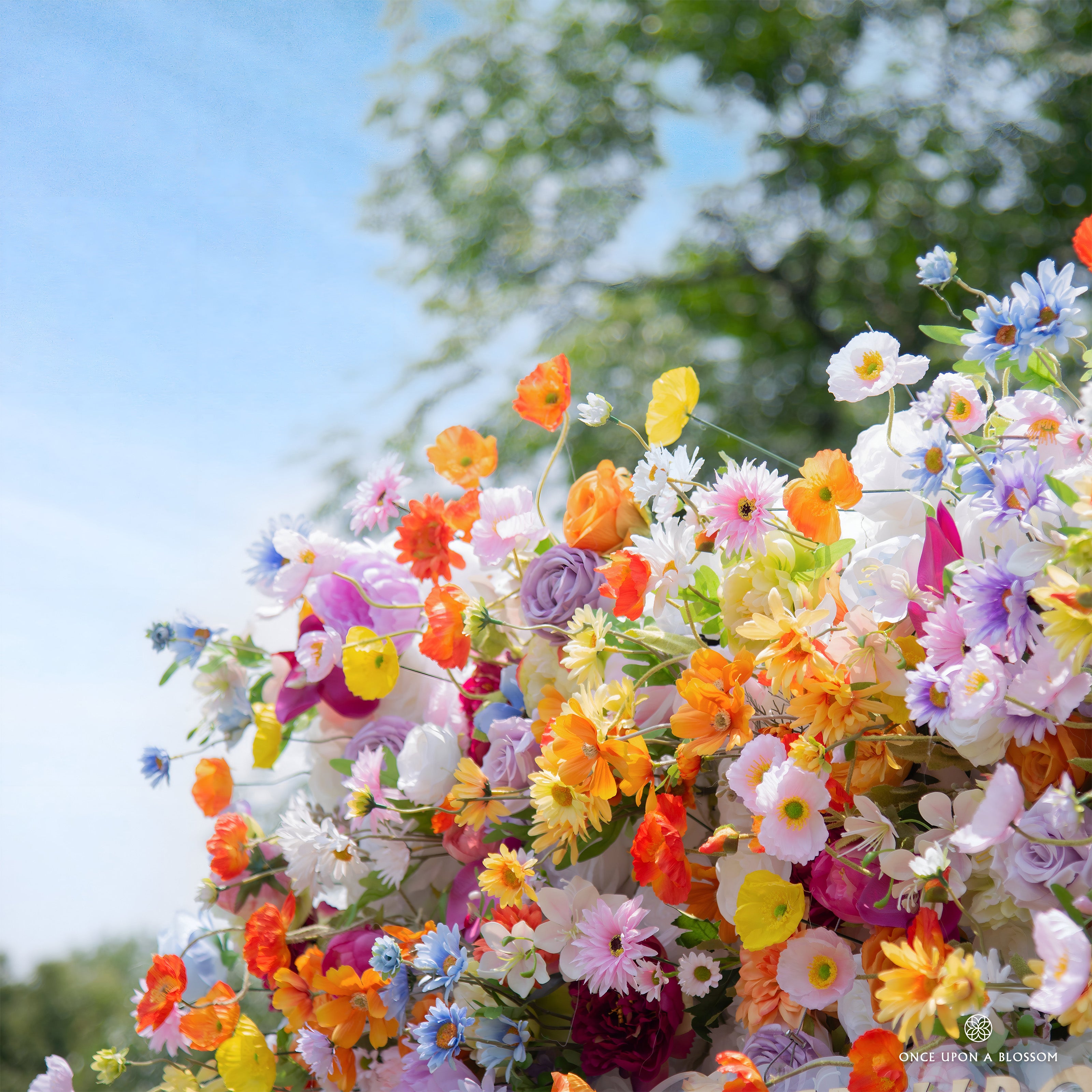 Texture shot of Wildflower Field—lively, multi-colored silk florals and foliage.