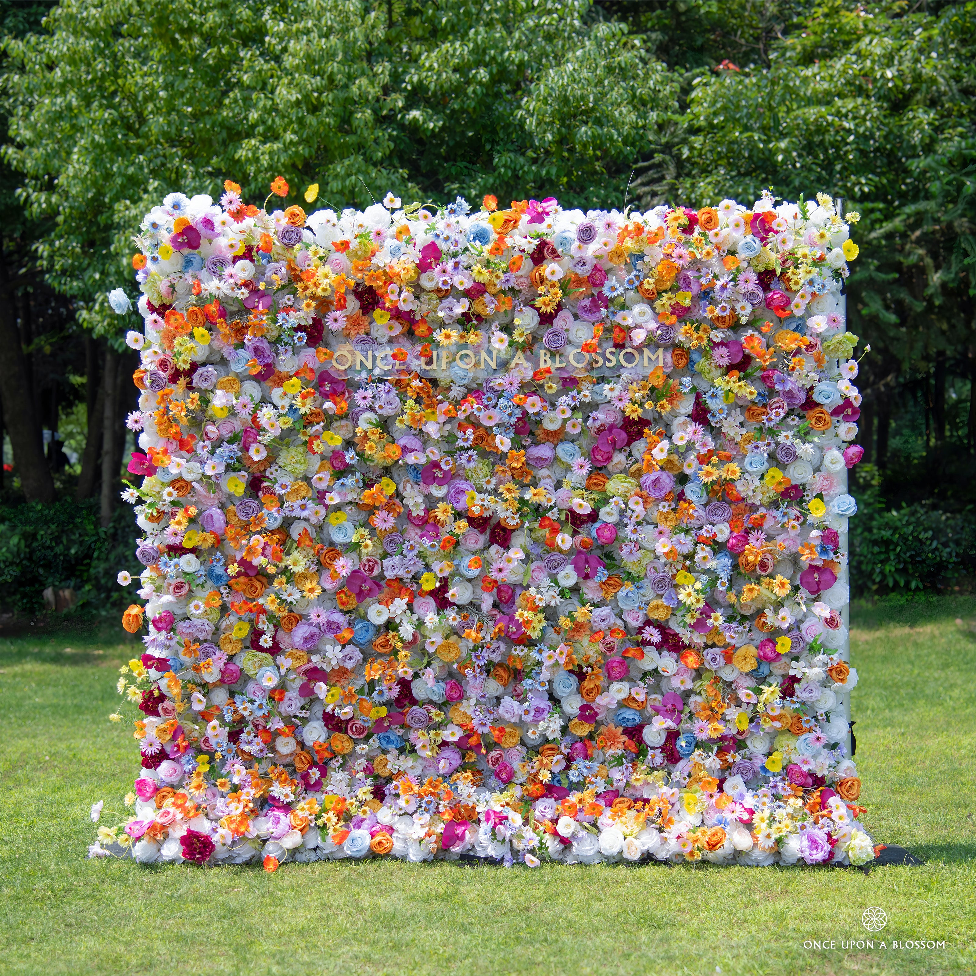 Front view of Wildflower Field flower wall with a mix of colorful blooms.