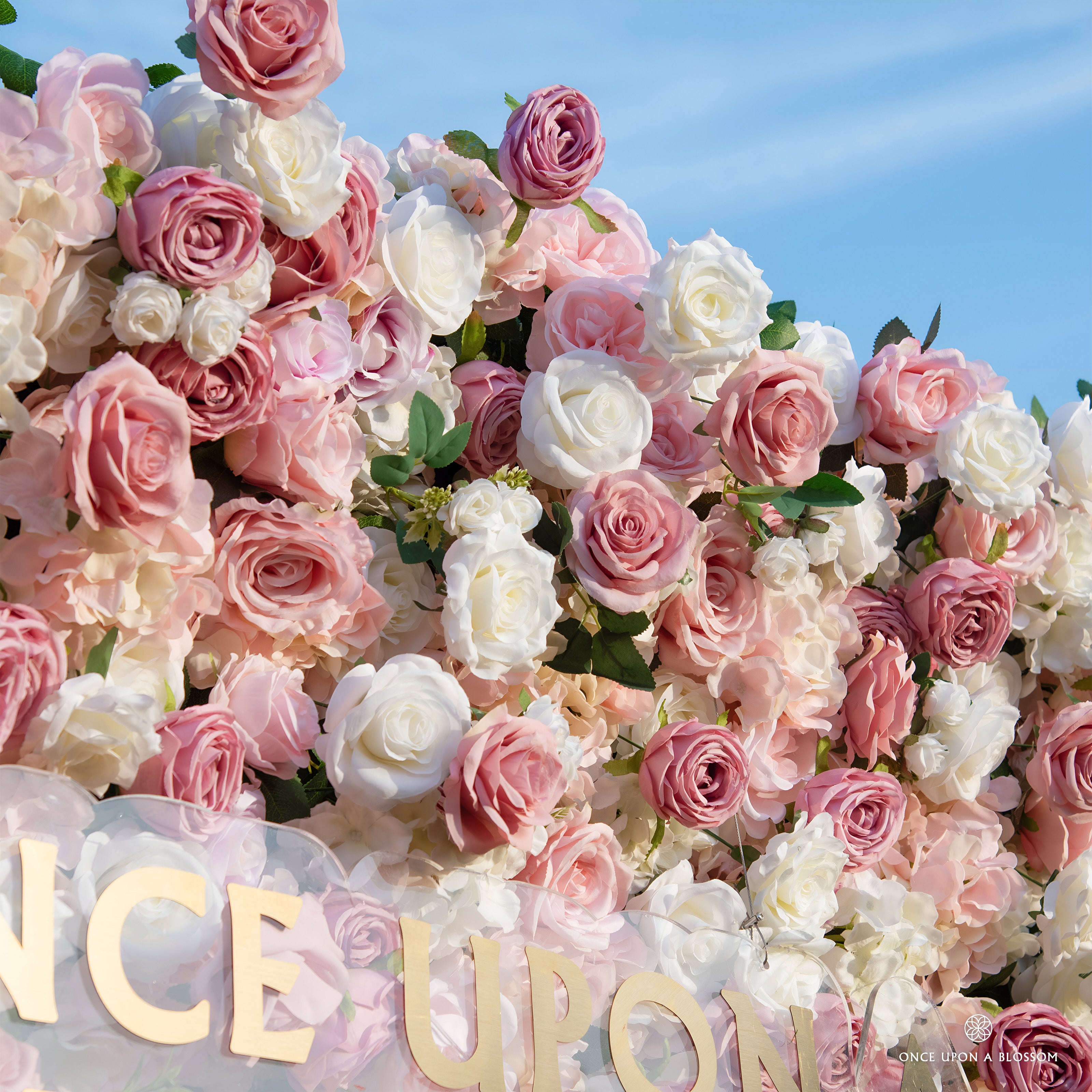 close-up of flower textures of light pink and white flower wall featuring roses, from our Rosé All Day.