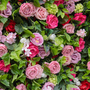 Detailed view of Summer Sangria flower wall, highlighting layered colors and texture.