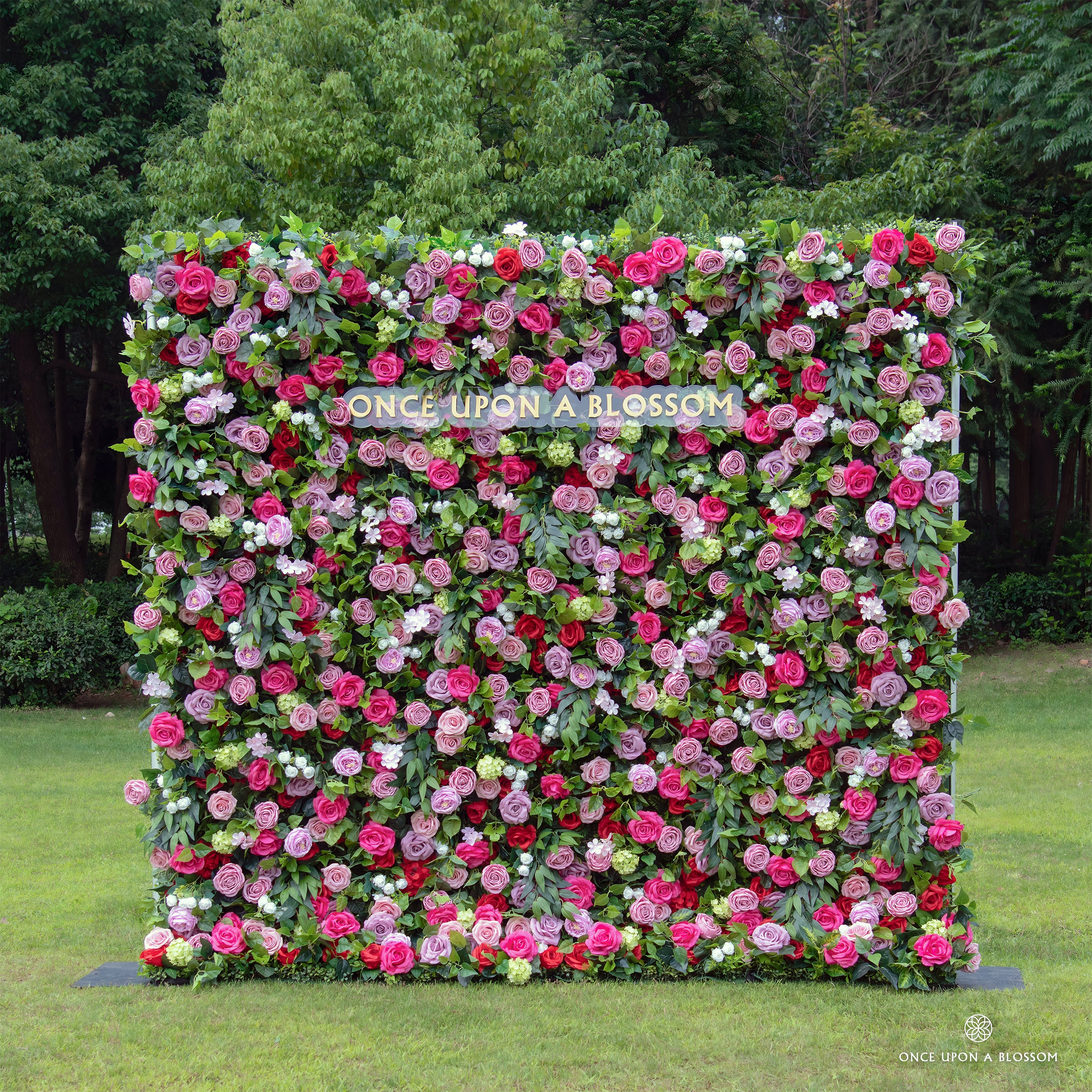 Front view of Summer Sangria purple flower wall with rich berry-toned roses.
