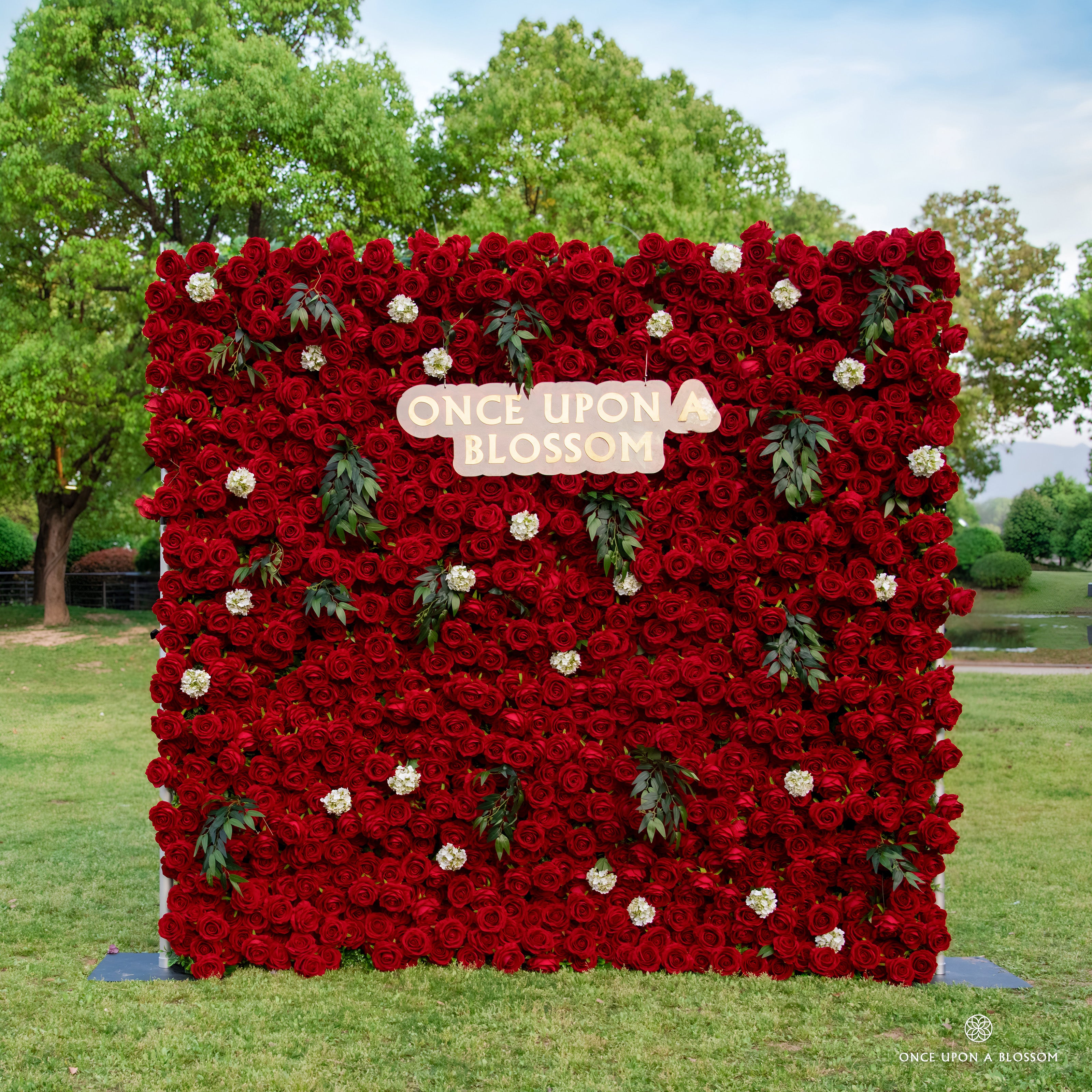 front view of red flower wall featuring premium red roses, from our Lost Roses.