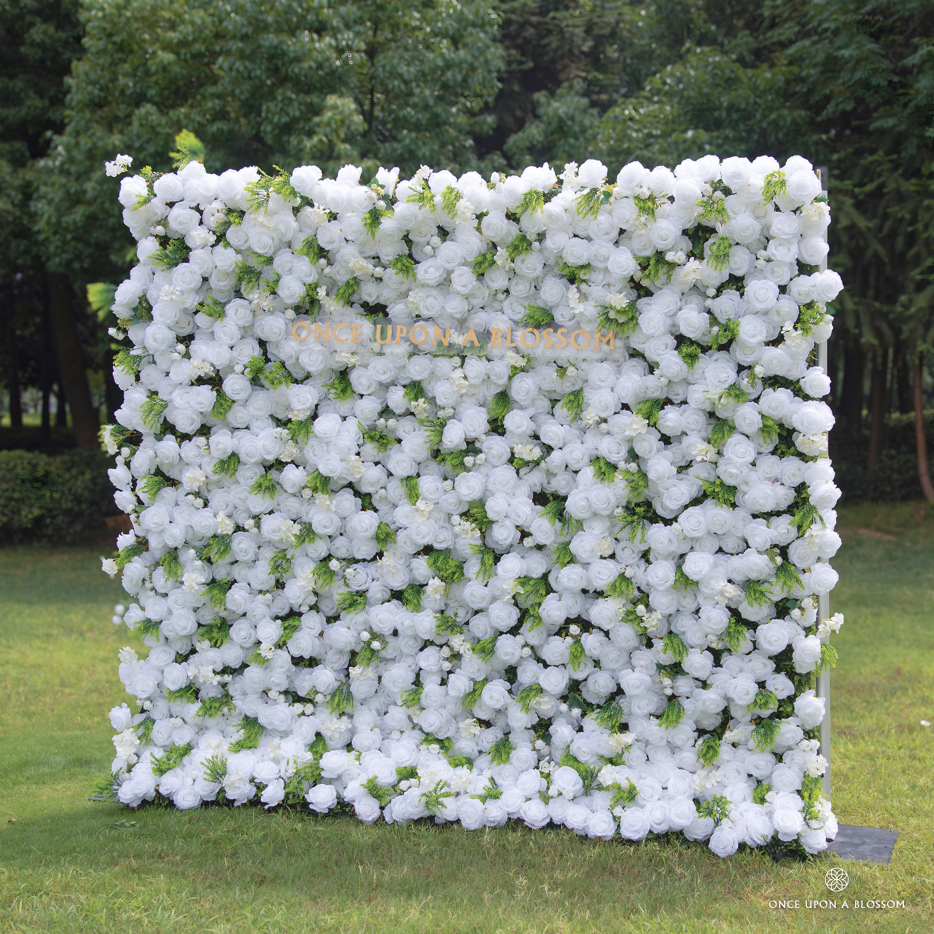 Side view of Garden Party flower wall backdrop showing layered greenery