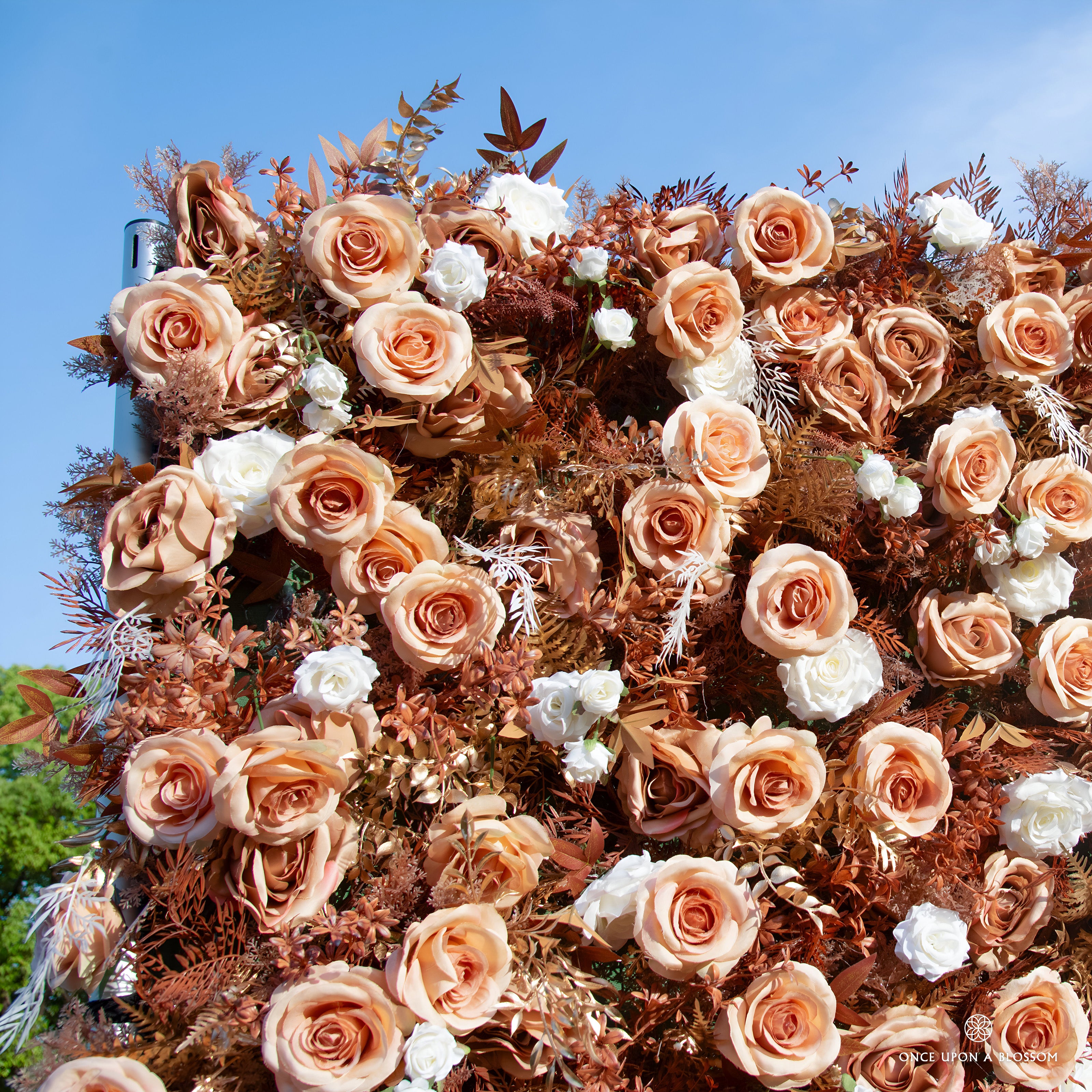 close-up of flower textures of gold, white, and orange flower wall featuring roses and golden leaves, from our Golden Hours.