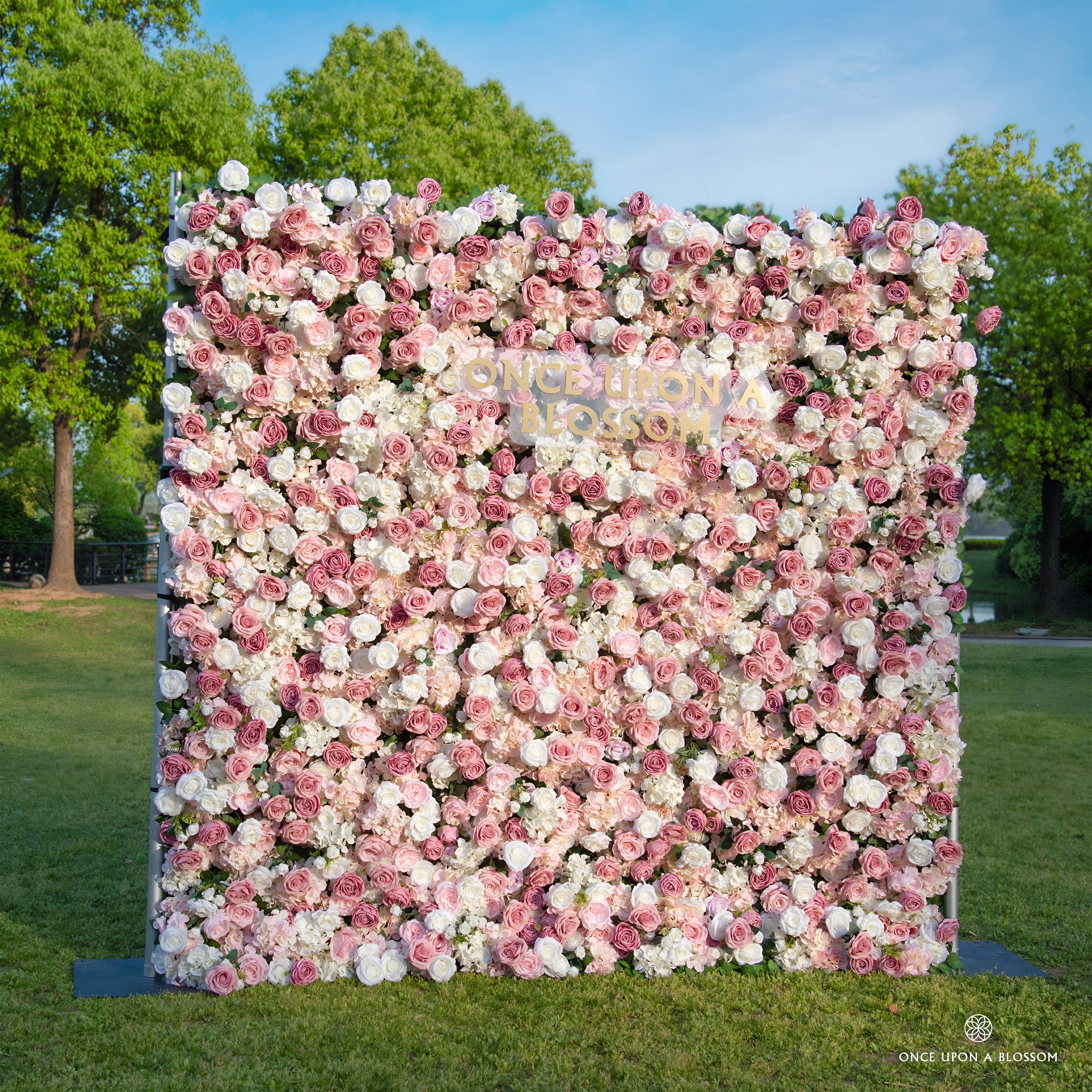 left-side angle of light pink, dark pink, and white flower wall featuring roses, from our Rosé All Day.