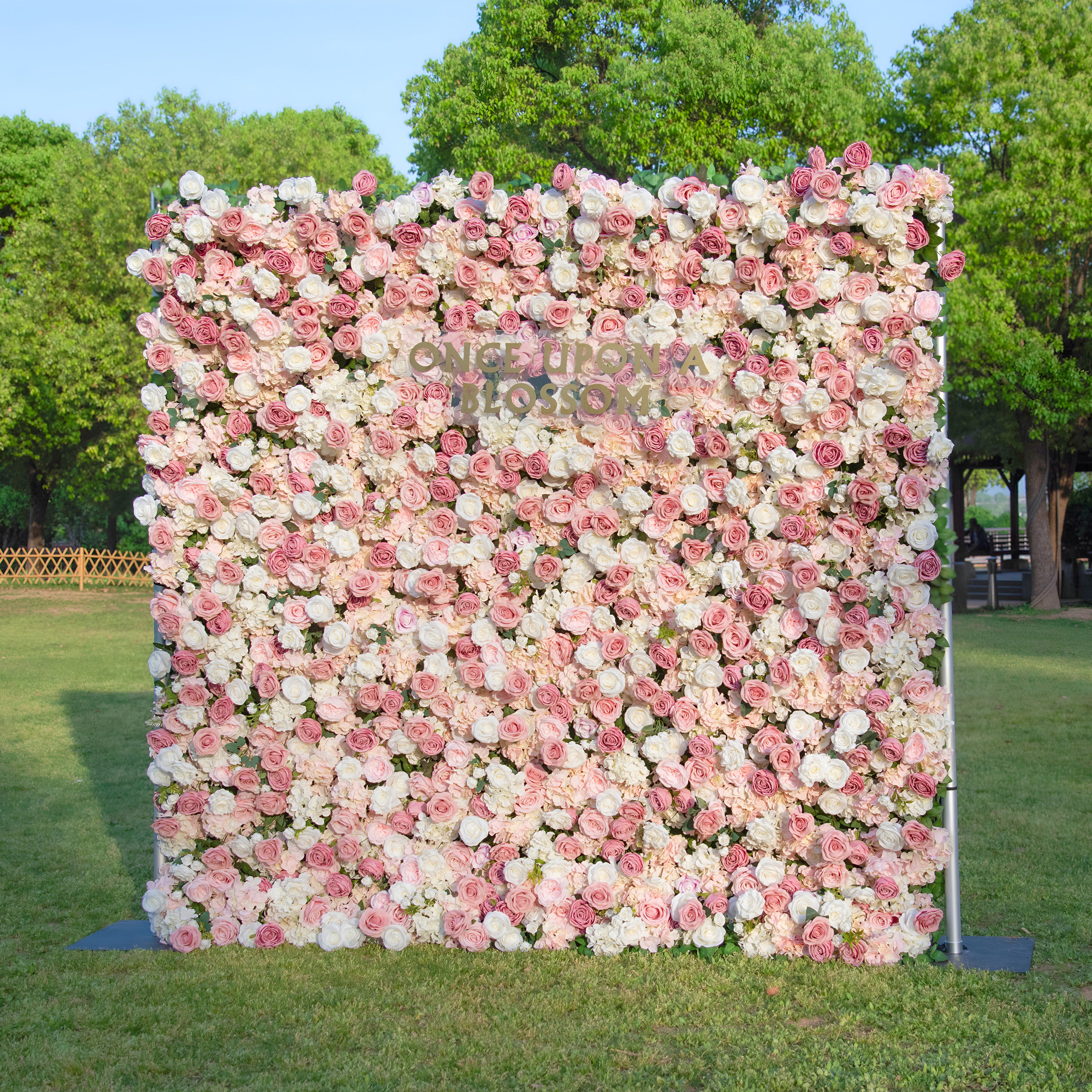 right-side angle of light pink, dark pink, and white flower wall featuring roses, from our Rosé All Day