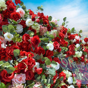 close-up of flower textures of red, white, and green flower wall featuring roses and greenery, from our Ruby Rouge.