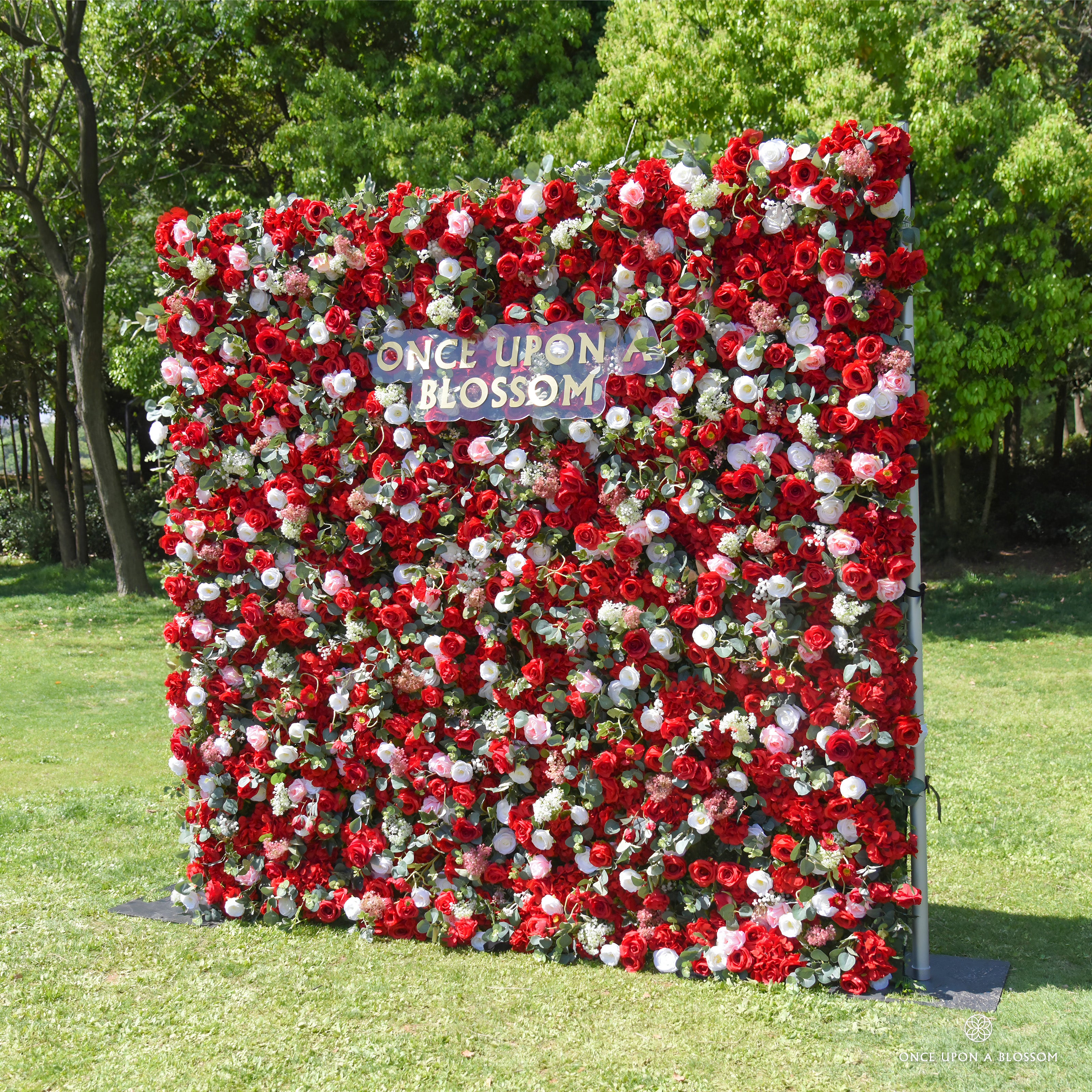 right-side view of red, white, and green flower wall featuring roses and greenery, from our Ruby Rouge.