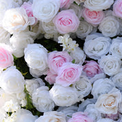Petal-level close-up of soft pink and white silk roses on the Sweet Nothings pink flower wall backdrop