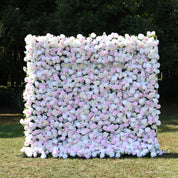 Front view of the Sweet Nothings pink and white flower wall backdrop, set outdoors for bridal showers and weddings