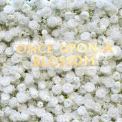 close-up of flower textures of white flower wall featuring white roses, from our Angel’s Breath